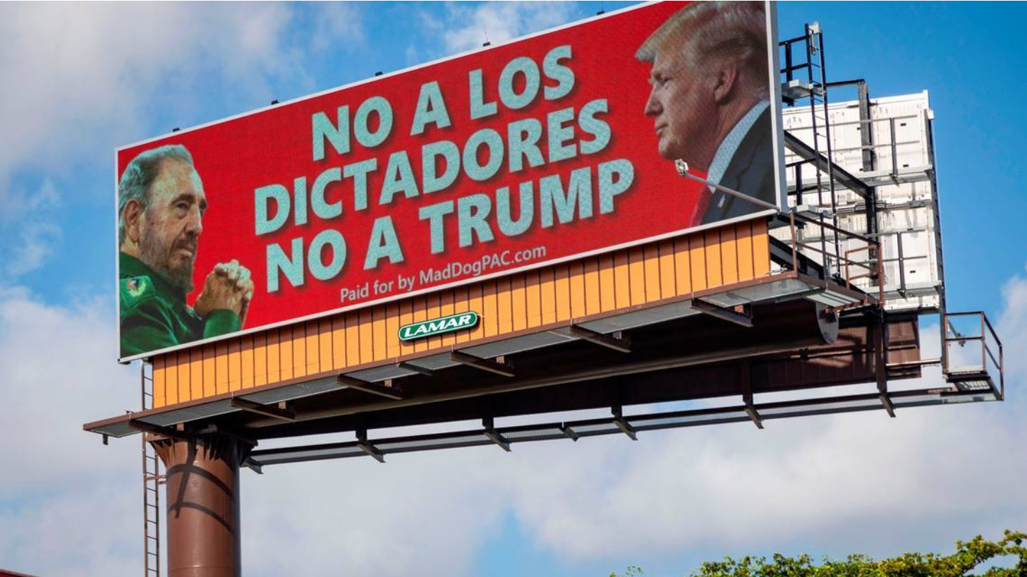 a-group-of-cubans-protest-in-miami-against-a-billboard-that-compares-trump-to-fidel-castro